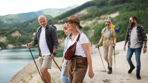 A family hiking together for their quality of life, physical health and bonding.